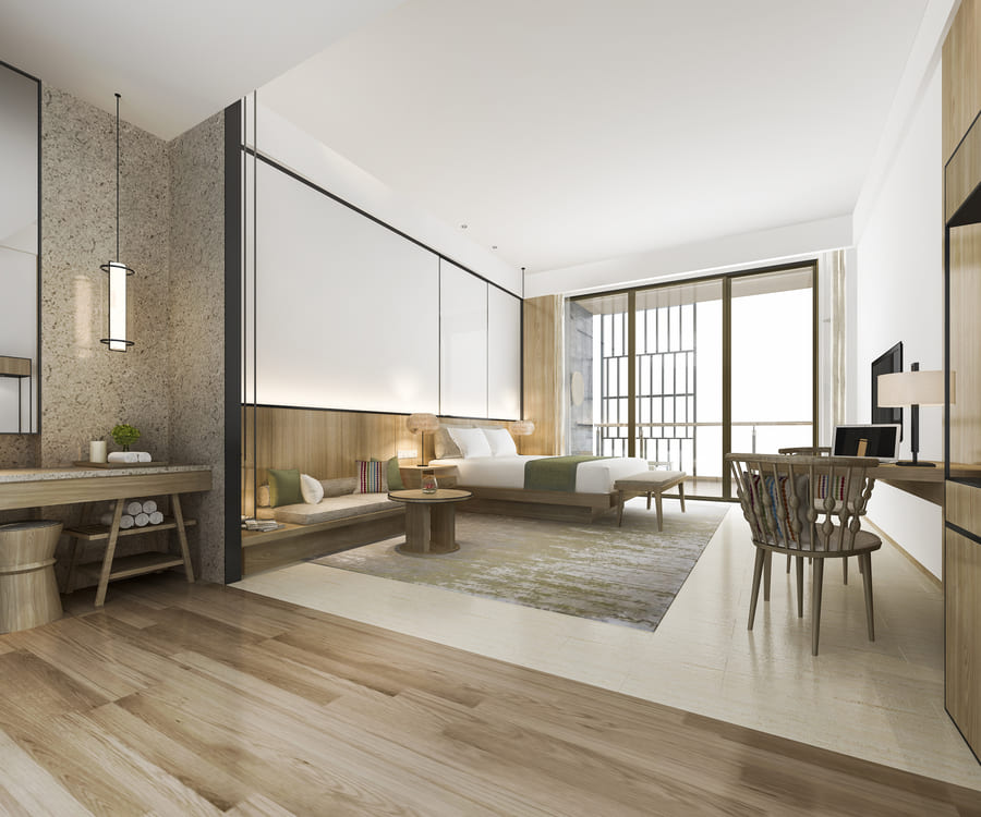 Amplia habitación de hotel de diseño moderno y minimalista con acabados de madera,
